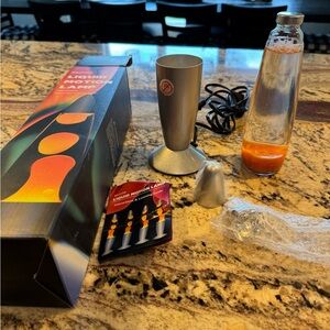 Silver Motion Lamp with Orange Liquid